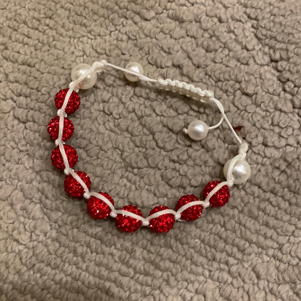 Selling red beaded adjustable bracelet